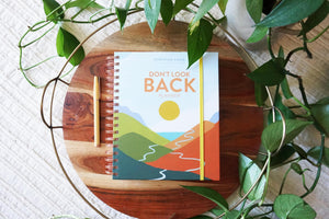 Don't Look Back Planner: A Yearlong Organizer for Getting Unstuck and Moving Forward with Passion and Purpose